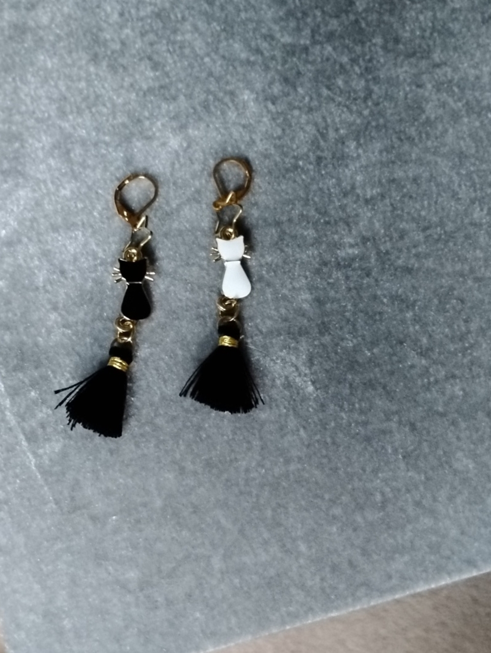 Hand Crafted Black & White Cat Earrings with 18 Kt Star Accent And Tassels